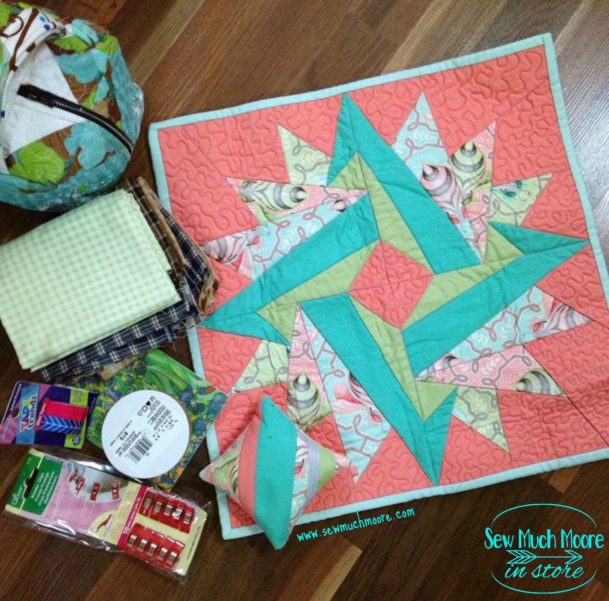 Make this lovely Springtime Mini Quilt! Get the pattern and materials list and get started! #Tutorial #Free #Pattern #Printables #Quilts #Pillows #Easy #Templates #Star #ForBeginners #Beginner #Art #Design #ArtDesign #Block #Hip #Trendy #SewMuchMoore #SewMuchMooreInStore