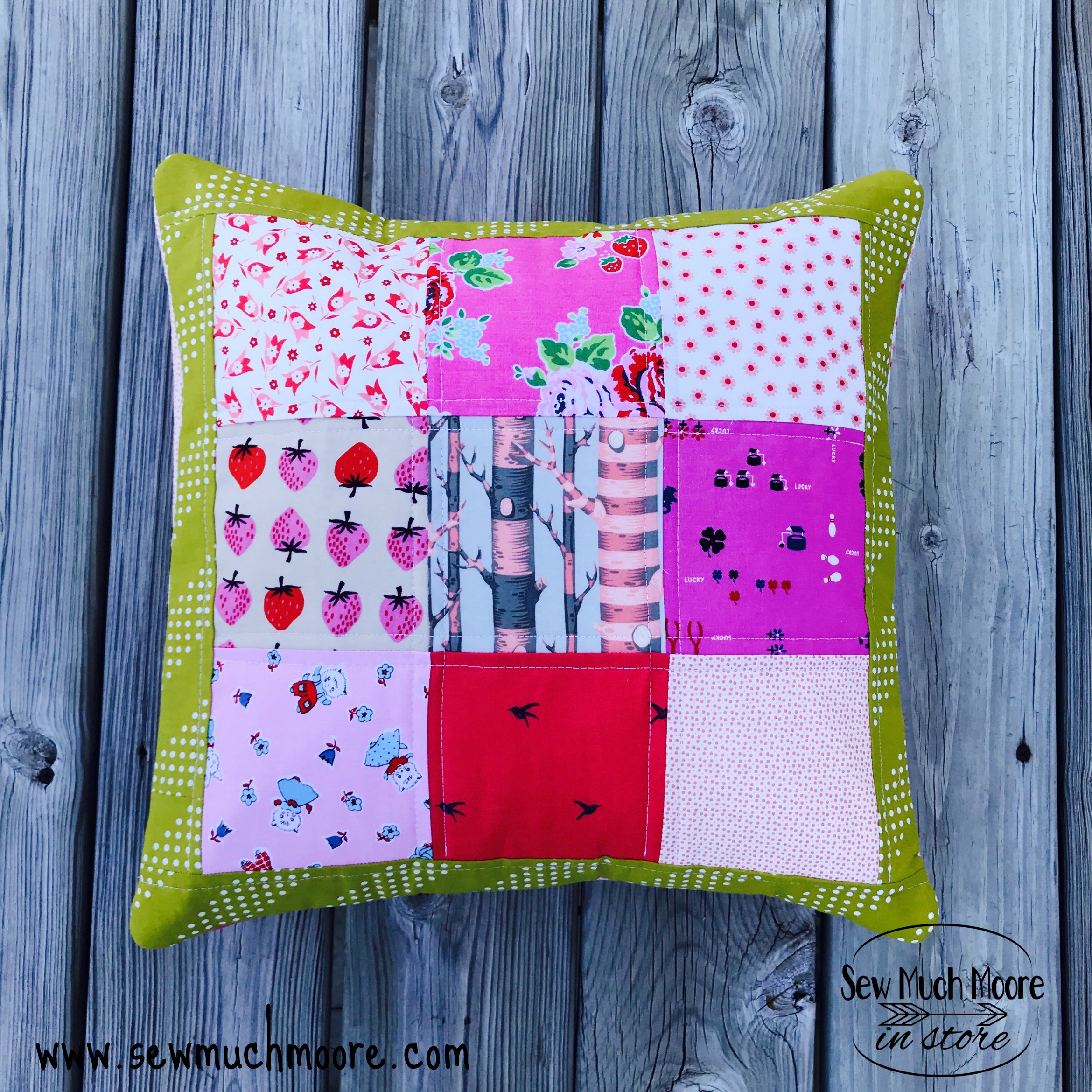 “Scrappy Throw” is a Free Nine-Patch Quilted Pillow Pattern designed by Nicole Moore from Sew Much More!
