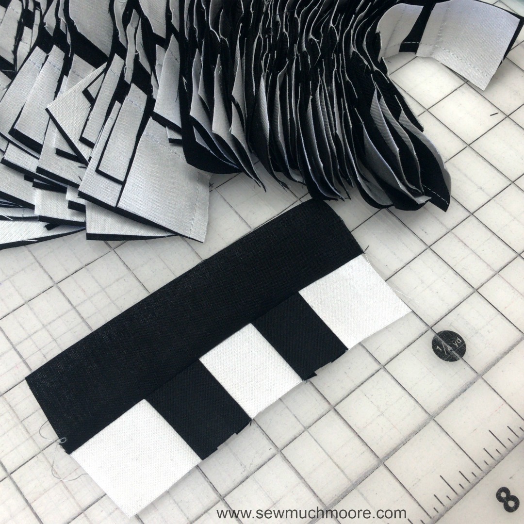 Hashtag Graduation Quilt - Make this fun and modern quilt! Watch the video and use the tutorial and make your own! #DIY #Quilt #ModernQuilting #HashtagQuiltBlock #HastagQuilt #StripologyRuler #ContemporaryQuilt