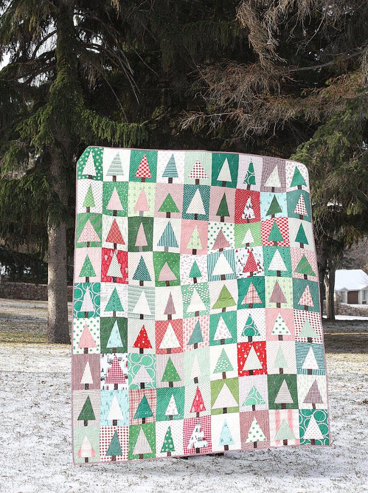 Improv Christmas Tree - Check out this collection of fun and exciting patterns! Get started on your own Handmade Christmas! #Pattern #Printables #Quilts #Pillows #Easy #Templates #ForBeginners #Beginner #Art #Design #ArtDesign #Block #ChristmasQuilt #ForBeginners #quilt #Quilts #Quilting #ideas #modern #ToMake #Simple #Blocks #Tutorial #quilting #sewing #handmade #Project #Patchwork #Contemporary #WalkingFoot #DIY #Fabric #Bedding #OfTheMonth #12” #Vintage #Modern #Star #Scrappy #Free #Quick #project #DIY #Sampler #Ideas #Basic #HST #12Inch #StepByStep #QuiltBlock #BOM #SewMuchMoore #SewMuchMooreInStore
