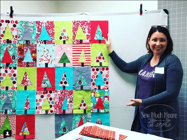 Modern Christmas Tree Quilt - Make this fun quilt and learn some tips to make your Guild Meetings fun again! #Christmas #ForBeginners #easy #quilt #Quilts #Quilting #ideas #modern#ToMake #Designs #Simple #Blocks #Tutorial #quilting #sewing #handmade #Project #Patchwork #Contemporary #WalkingFoot #DIY #Fabric #Bedding #Hip #Trendy #SewMuchMoore #SewMuchMooreInStore