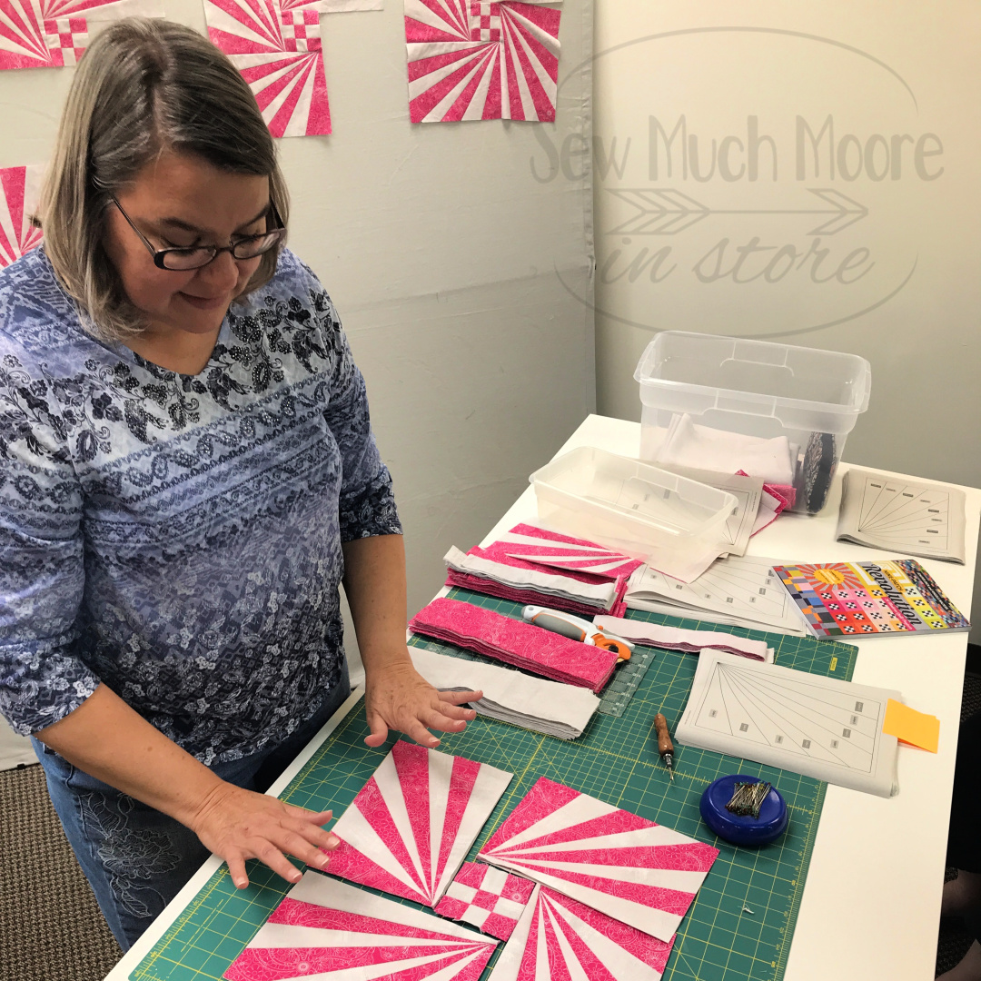 The Starburst Quilt is a fun and lively pattern that is perfect for the confident beginner! This block is easier to make than you think! Learn more here! #Pattern #Quilts #Pillows #Easy #Templates #ForBeginners #ConfidentBeginner #Art #Design #ArtDesign #Block #Hip #Trendy #ModernQuilt #ModernQuilting #SewMuchMoore #SewMuchMooreInStore 