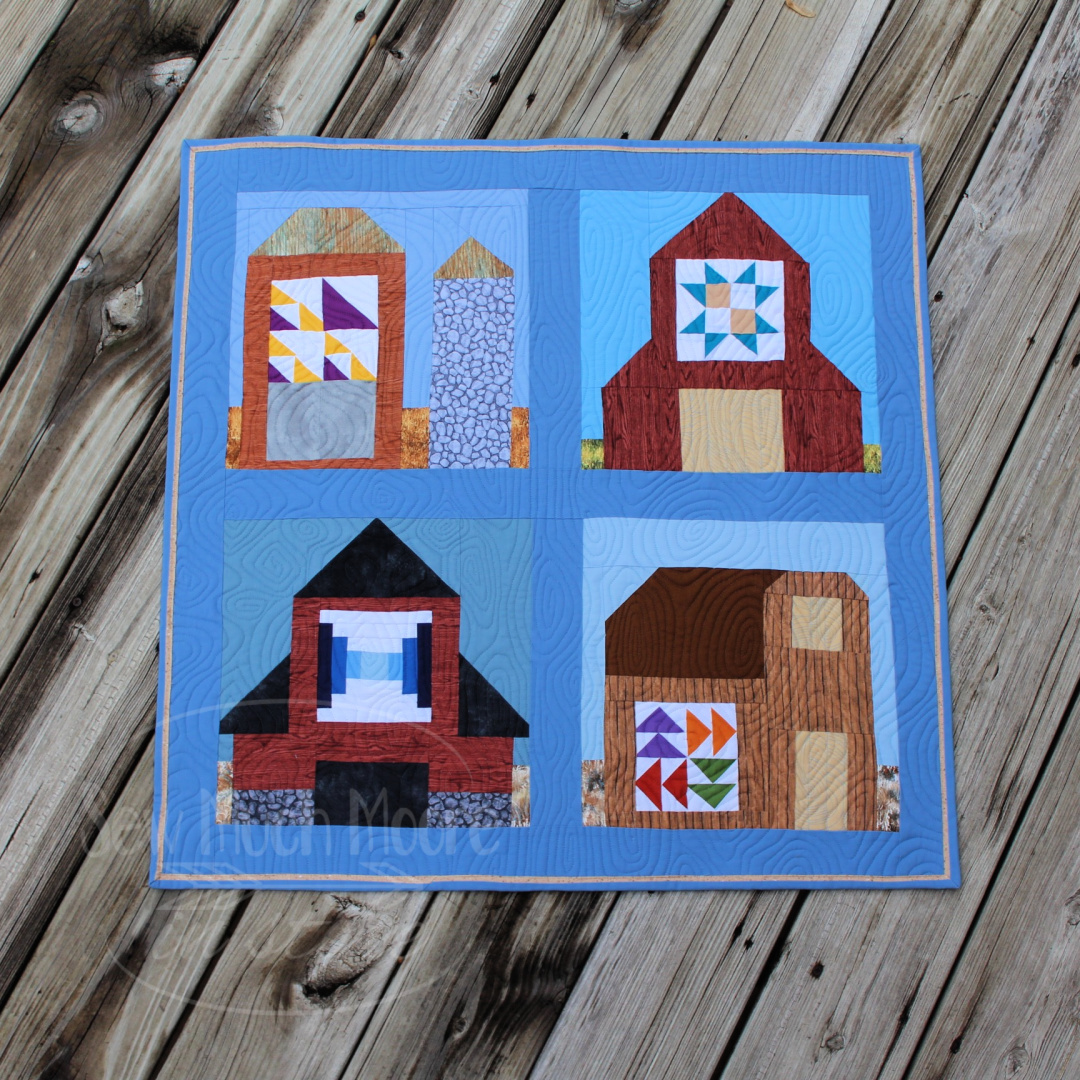 Make your own Barn Mini Quilt with DIY block of the month kits! You can make one or make all twelve! #Easy #Patterns #Tutorial #Simple #OfTheMonth #12” #Vintage #Modern #Star #ForBeginners #Scrappy #Quick #project #Fabric #Patchwork #DIY #Sampler #Ideas #Basic #HST #12Inch #StepByStep #Quilt #QuiltBlock #BOM #Quilting #Quilter #SewMuchMoore #SewMuchMooreInStore