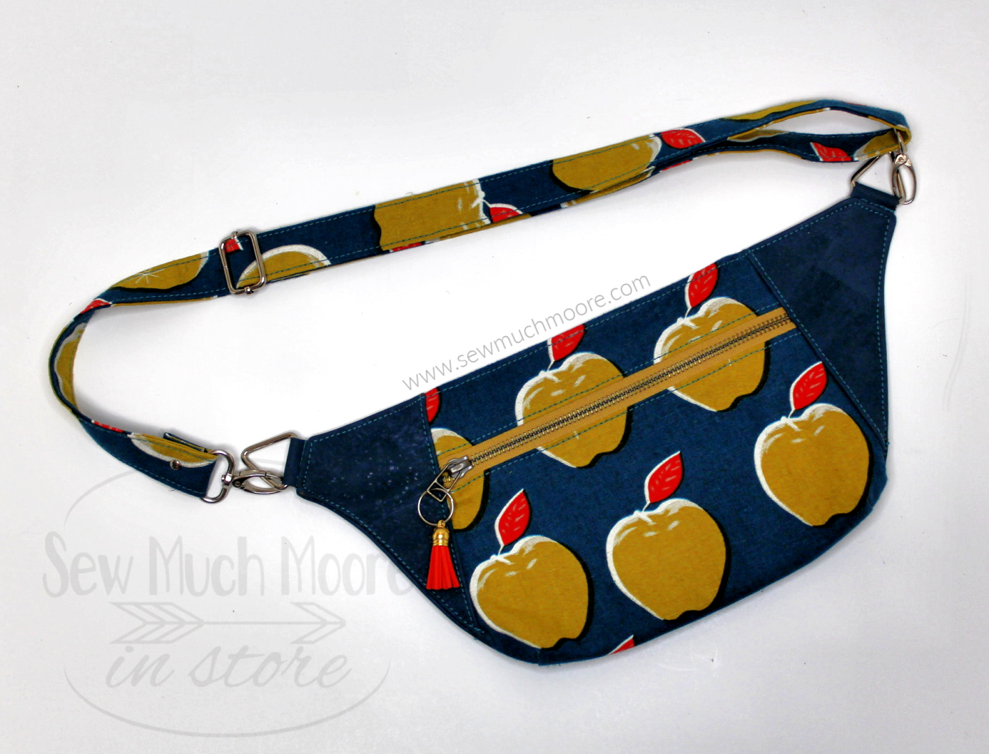 Fanny Packs are the perfect bag for travel and for hands free! The Dayna Pack is a great Fanny Pack pattern. Get this fun and simple pattern to make your own Fanny Pack! Watch the video tutorial too! #FannyPack #DaynaPack #HowTo #DIY #VideoTutorial #StepByStep #VideoInstructions #BagMaker #SewMuchMoore #SewMuchMooreInStore