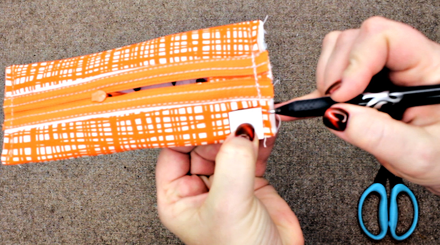 These Mini Boxy Pouches are perfect for gift giving or to make for yourself! They are quick and easy. I made a video tutorial too! Check it out! #FreePattern #MiniBoxyPouch #SewingTutorial #VideoTutorial #YoutubeTutorial #FreeSewing #ZipperPouch #MiniPouch #QuickGift #HandmadeGift #TweenGift #TeenGift #backpackPouch #SewMuchMooreInStore #SewMuchMoore