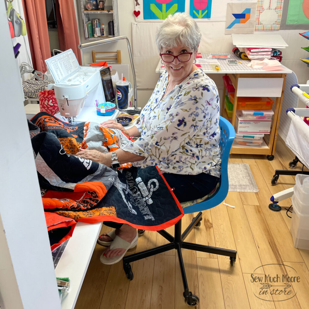 Mom binds the quilt - High School Graduation T-Shirt Quilt